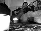Nick Santini playing guitar.