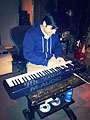 Nick Santini playing keyboard.